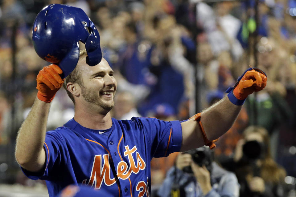 New York Mets' Pete Alonso takes a curtain call after hitting his 52nd home run of the season during the first inning of a baseball game against the Atlanta Braves, Friday, Sept. 27, 2019, in New York. (AP Photo/Adam Hunger)