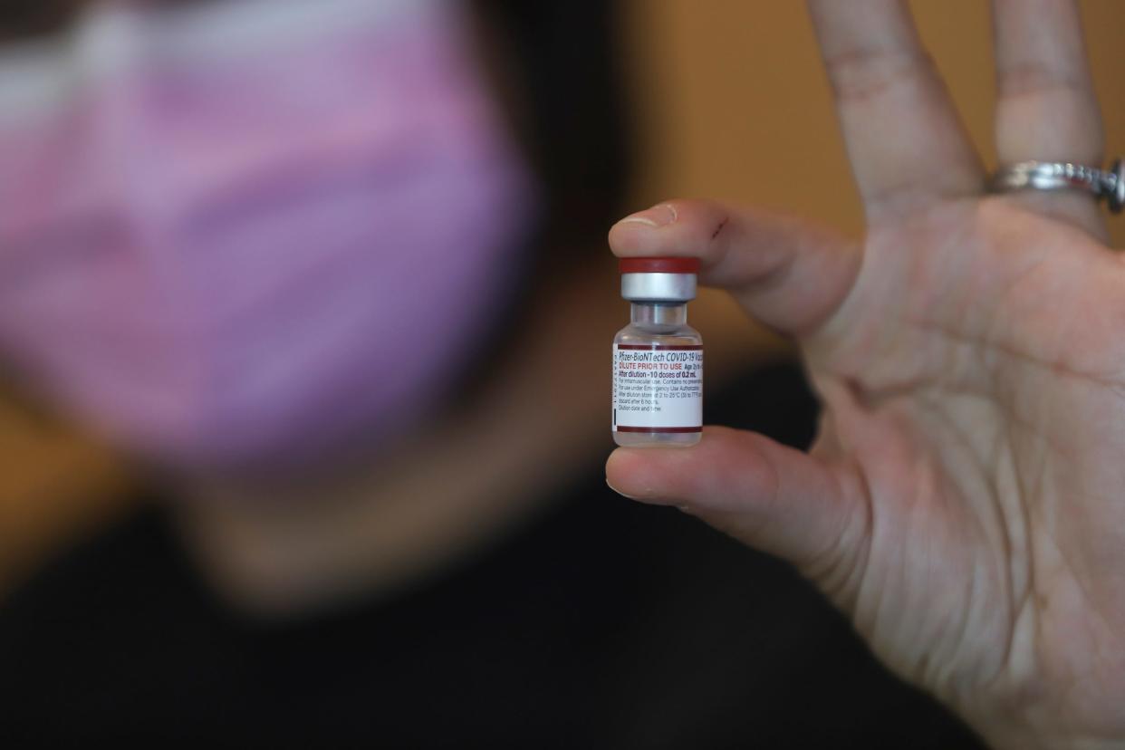 A vial of Pfizer vaccine for kids 5 and younger is shown at Bloom Pediatrics in Birmingham, Michigan, on June 22. Vaccines from Pfizer and Moderna are now available to children as young as 6 months.