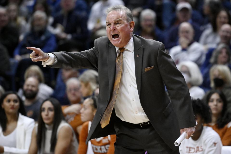 Texas head coach Vic Schaefer reacts during the first half of an NCAA college basketball game against Connecticut, Monday, Nov. 14, 2022, in Storrs, Conn. (AP Photo/Jessica Hill)