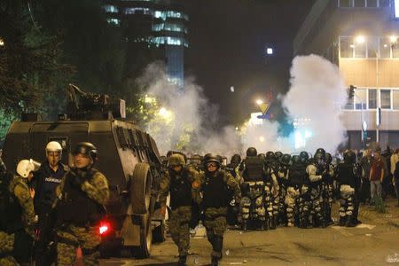 Macedonian riot police block the road near the parliament in Skopje. Macedonia April 27, 2017. REUTERS/Ognen Teofilovski