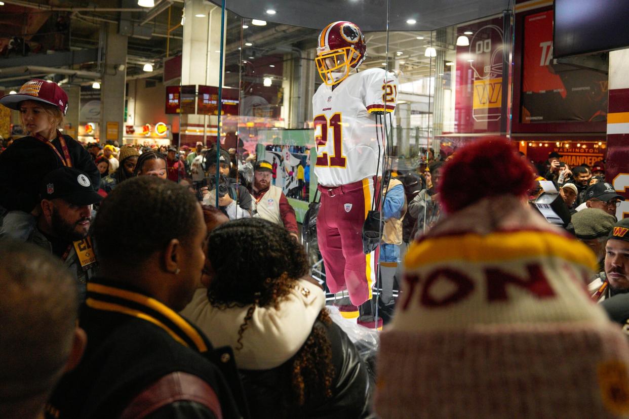 Fans attends the unveiling of the Sean Taylor Memorial, before the start of an NFL football game between the Atlanta Falcons and Washington Commanders, in Landover, Md. On the 15th anniversary of the death of Taylor, ever Commander player will wear a No. 21 decal on their helmet Falcons Commanders Football, Landover, United States - 27 Nov 2022