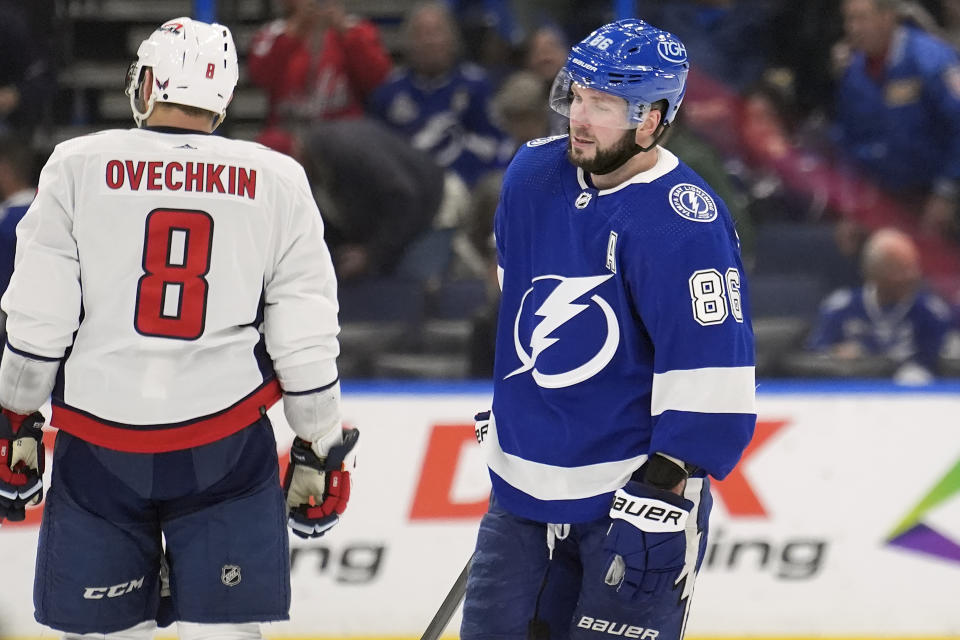 Tampa Bay Lightning right wing Nikita Kucherov (86) skates past Washington Capitals left wing Alex Ovechkin (8) after the Lightning lost to the Capitals during an NHL hockey game Thursday, Feb. 22, 2024, in Tampa, Fla. (AP Photo/Chris O'Meara)