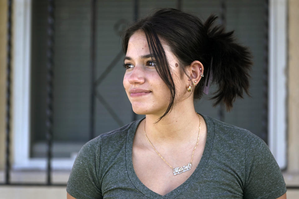 Adismarys Abreu, 16, poses for a photo at her home, Tuesday, Aug. 23, 2022, in Miami. Abreu had been discussing a long-lasting birth control implant with her mother for about a year as a potential solution to increasing menstrual pain. Then Roe v. Wade was overturned, and Abreu joined the throng of teens rushing to their doctors as states began to ban or severely limit abortion. (AP Photo/Wilfredo Lee)