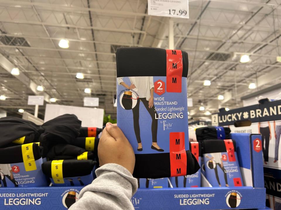 hand holding up a pack of leggings in costco