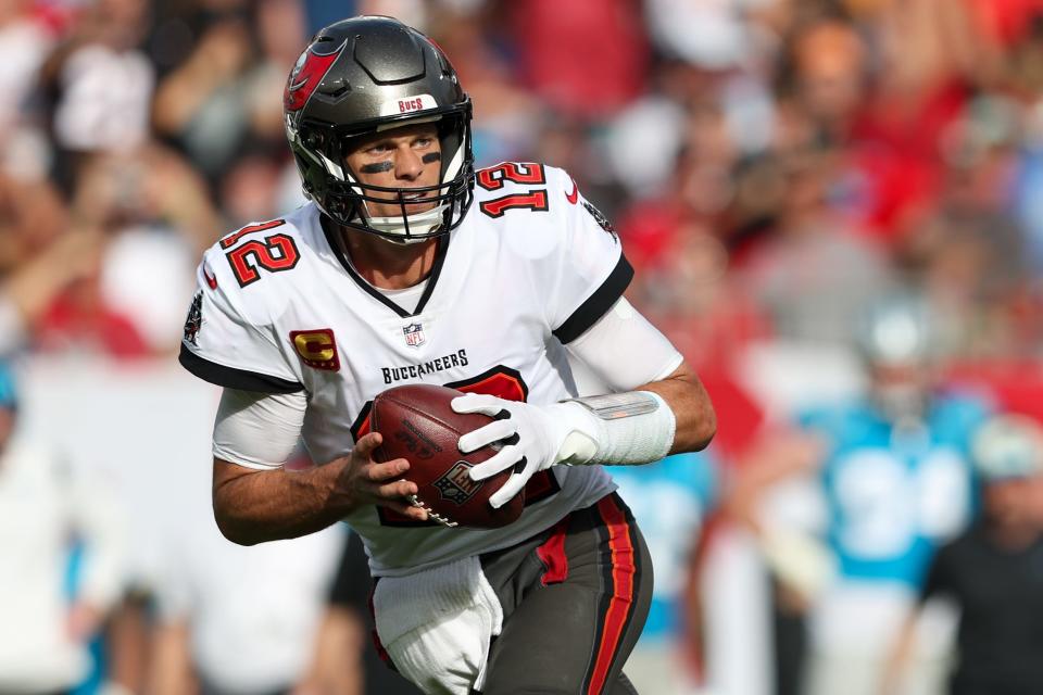 Tampa Bay Buccaneers quarterback Tom Brady (12) drops back to pass against the Carolina Panthers in the fourth quarter at Raymond James Stadium.