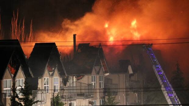 A fire at 31560 Delair Road in Abbotsford spread across the roof of the apartment building from one end to the other.