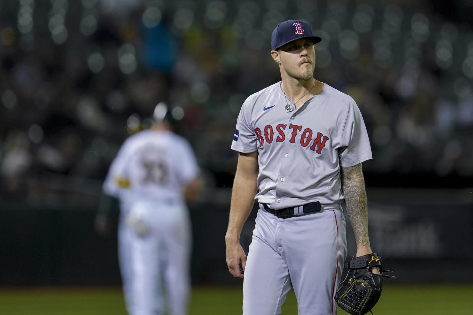 Boston Red Sox's Tanner Houck walks to the dugout after pitching against the Oakland Athletics during the fourth inning of a baseball game Monday, April 1, 2024, in Oakland, Calif. (AP Photo/Godofredo A. Vásquez)