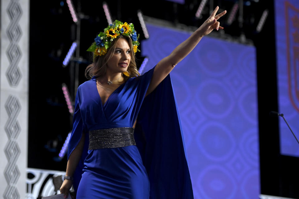 LAS VEGAS, NEVADA - APRIL 28: Jenny Arata of Ukraine gives the peace sign onstage prior to round one of the 2022 NFL Draft on April 28, 2022 in Las Vegas, Nevada. (Photo by David Becker/Getty Images)