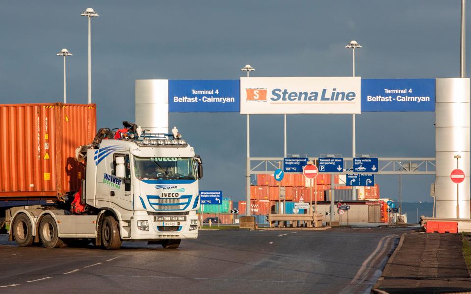 A lorry leaves the docks area in Belfast Harbour in Northern Ireland. The port is Northern Ireland’s main maritime gateway (AFP via Getty Images)
