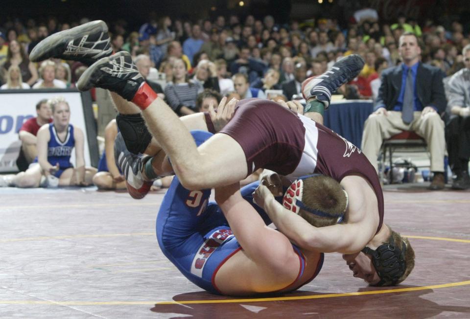 North Linn's Daniel LeClere, top, beat Brett Rose of Woodbury Central of Moville and won his fourth state championship in 2005 at Veterans Memorial Auditorium.