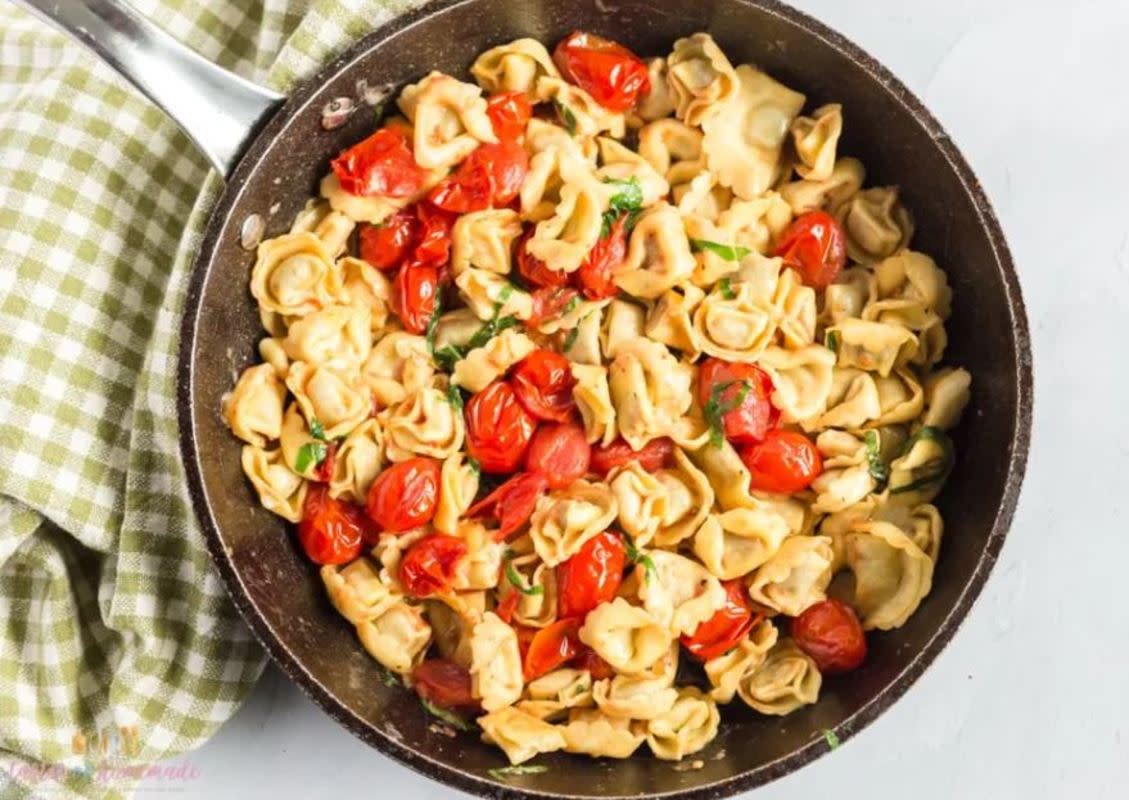 <p>Tastes of Homemade</p><p>The sauce on this pasta is very light, but because you are using fresh tomatoes and basil it is full of flavor.</p><p><strong>Get the recipe: <a href="https://tastesofhomemade.com/tomato-basil-skillet-tortellini/" rel="nofollow noopener" target="_blank" data-ylk="slk:Tomato Basil Skillet Tortellini;elm:context_link;itc:0;sec:content-canvas" class="link rapid-noclick-resp">Tomato Basil Skillet Tortellini</a></strong></p>