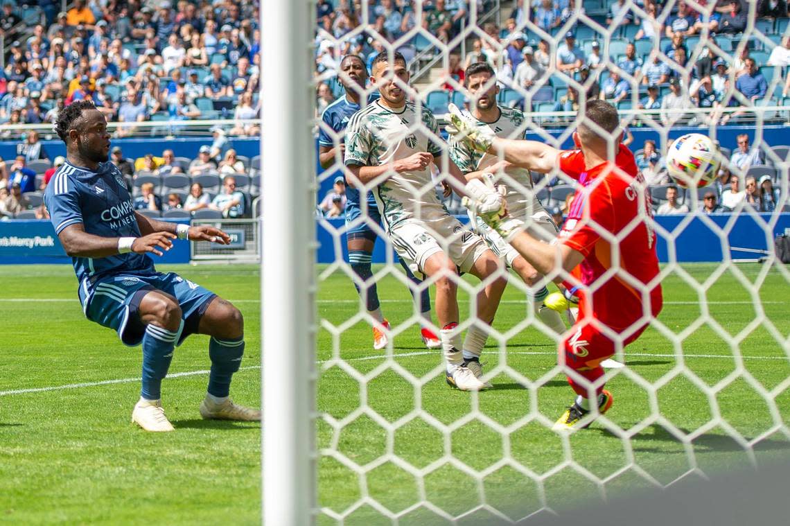 Sporting Kansas City forward Willy Agada scores his club’s second goal of Sunday’s match against the Portland Timbers at Children’s Mercy Park in Kansas City, Kan.