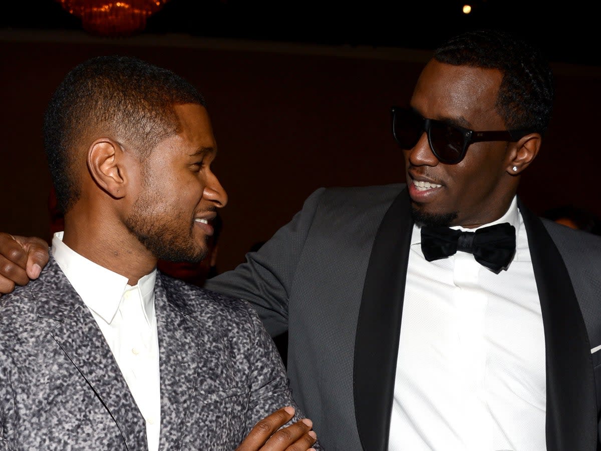 Usher and Diddy at the Grammy Awards pre-party honouring LA Reid, 2013 (Getty Images for NARAS)