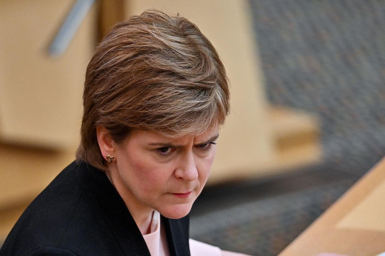 Scotland's First Minister Nicola Sturgeon attends the final First Minster's Questions (FMQ's) before the summer recess, at the Scottish Parliament in Edinburgh, Scotland, on June 24, 2021. (Photo by Jeff J Mitchell / POOL / AFP) (Photo by JEFF J MITCHELL/POOL/AFP via Getty Images)