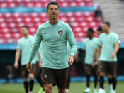 Portugal's Cristiano Ronaldo attends a team training session at the Ferenc Puskas stadium in Budapest, Monday, June 14, 2021 the day before the Euro 2020 soccer championship group F match between Hungary and Portugal. (AP Photo/Darko Bandic)