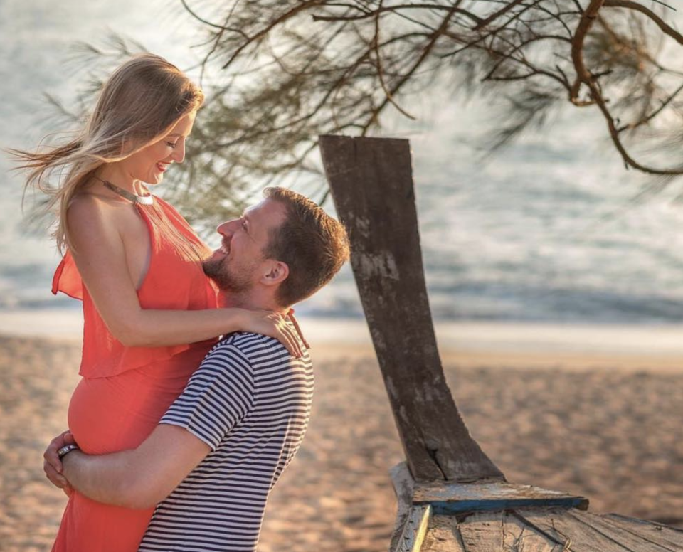 Czech woman Eliska Frank pictured with her husband Martin on a beach.