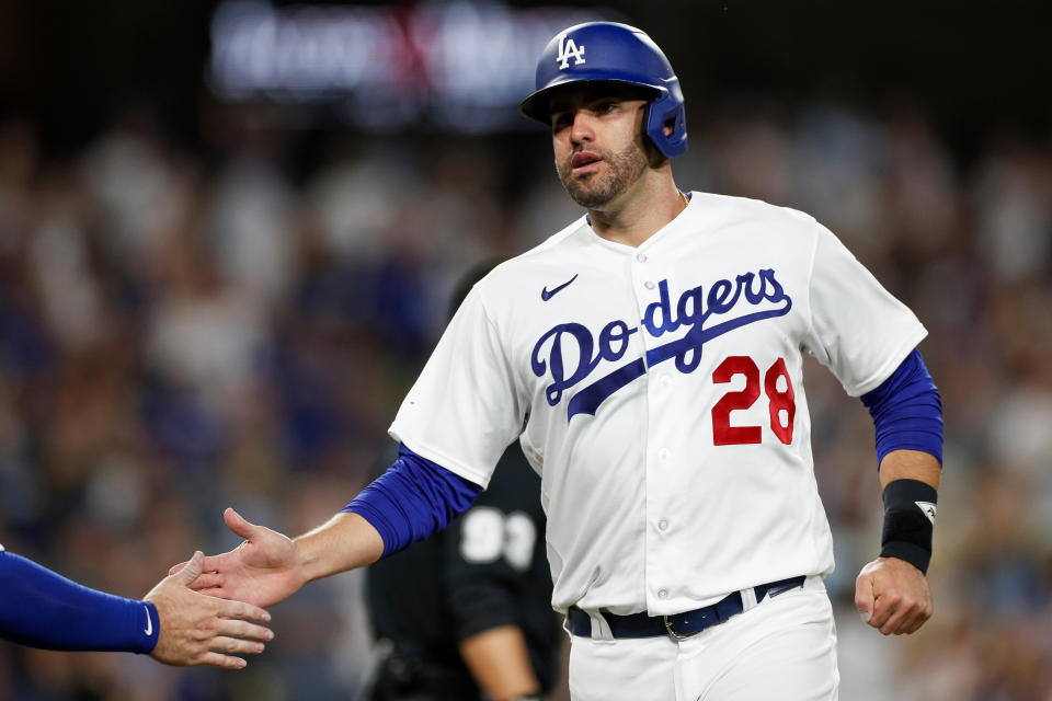 LOS ANGELES, CALIFORNIA - AUGUST 15: J.D. Martinez #28 of the Los Angeles Dodgers celebrates after scoring a run during the sixth inning against the Milwaukee Brewers at Dodger Stadium on August 15, 2023 in Los Angeles, California. (Photo by Brandon Sloter/Getty Images)