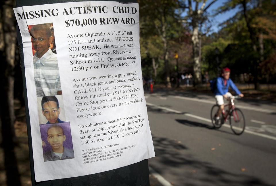 A missing poster is taped to a pole in Central Park for Avonte Oquendo, a 14-year-old autistic youth, in New York October 20, 2013. Oquendo has been missing for two weeks since walking out of his school, and a $70,000 reward has been offered for his safe return. (REUTERS/Carlo Allegri)