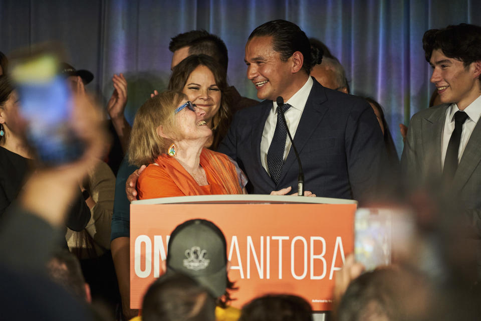 Manitoba NDP leader Wab Kinew delivers his victory speech and wishes his mother, Kathi Avery Kinew, a happy birthday, after winning the Manitoba Provincial election in Winnipeg, Manitoba, Tuesday, Oct. 3, 2023. The Canadian province of Manitoba has elected the first First Nations premier of a province in Canada. (David Lipnowski/The Canadian Press via AP)