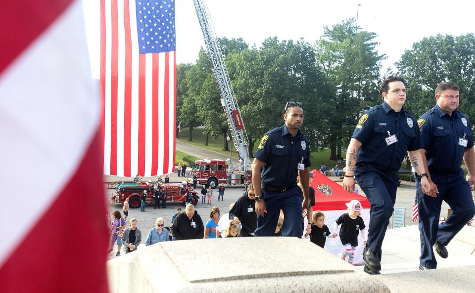 Hundreds of people participated in the 9/11 Memorial Stair Climb at the McKinley National Memorial on Monday. The Canton Fire Department sponsored the fourth annual event.