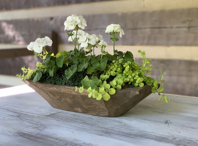 <p><a href="https://www.therootsofhome.com/2021/05/how-to-make-dough-bowl-centerpiece.html" data-component="link" data-source="inlineLink" data-type="externalLink" data-ordinal="1" rel="nofollow">The Roots of Home</a></p>
