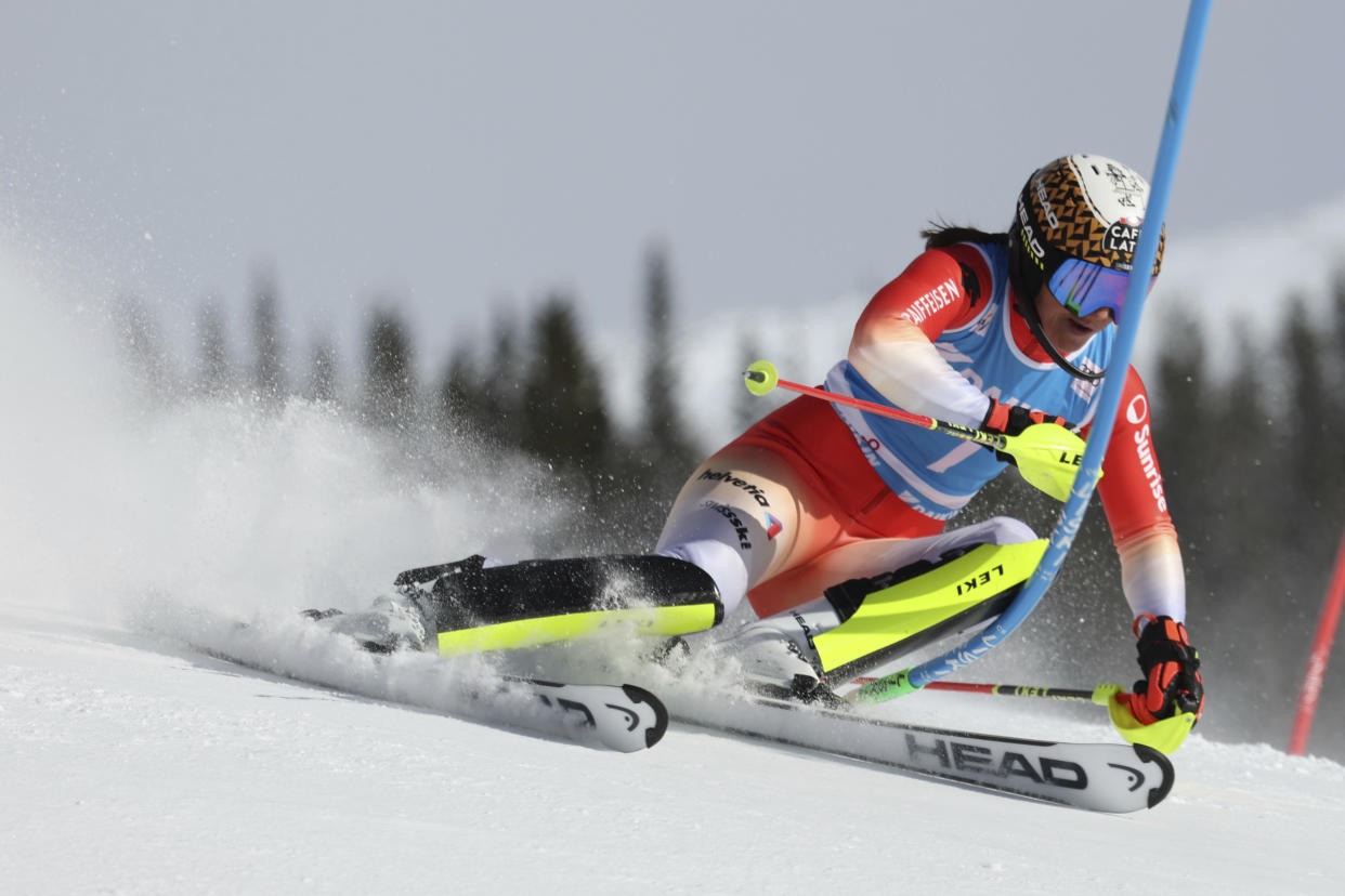 Switzerland's Wendy Holdener speeds down the course during an alpine ski, women's World Cup slalom, in Are, Sweden, Saturday, March 11, 2023. (AP Photo/Alessandro Trovati)