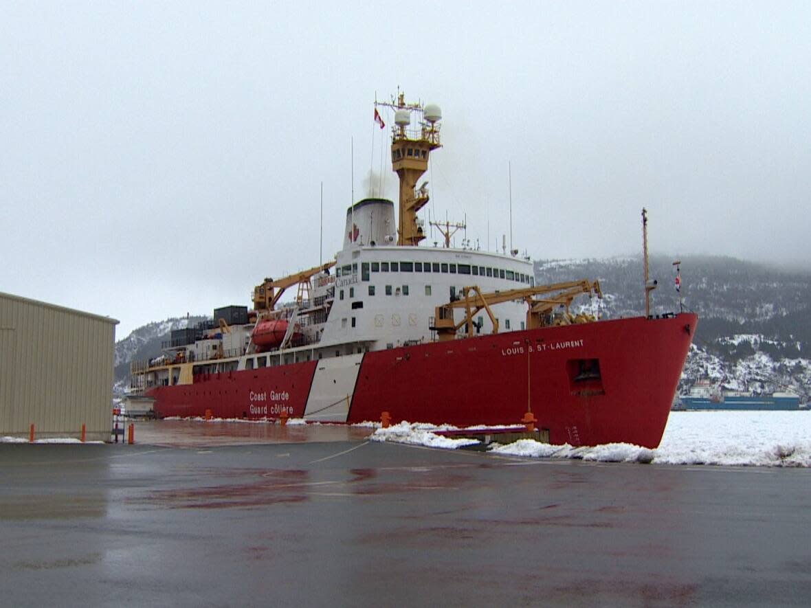 The Louis S. St-Laurent, the Canadian Coast Guard's largest icebreaker ship, had to break up a layer of sea ice that floated into the St. John's harbour to allow the safe passage of other boats. (Chelsea Jacobs/CBC - image credit)