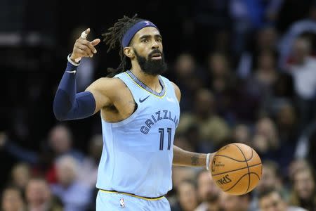 Dec 12, 2018; Memphis, TN, USA; Memphis Grizzlies guard Mike Conley (11) signals while moving the ball down the court during the game against the Portland Trailblazers at FedExForum. Memphis won 92-83. Mandatory Credit: Nelson Chenault-USA TODAY Sports