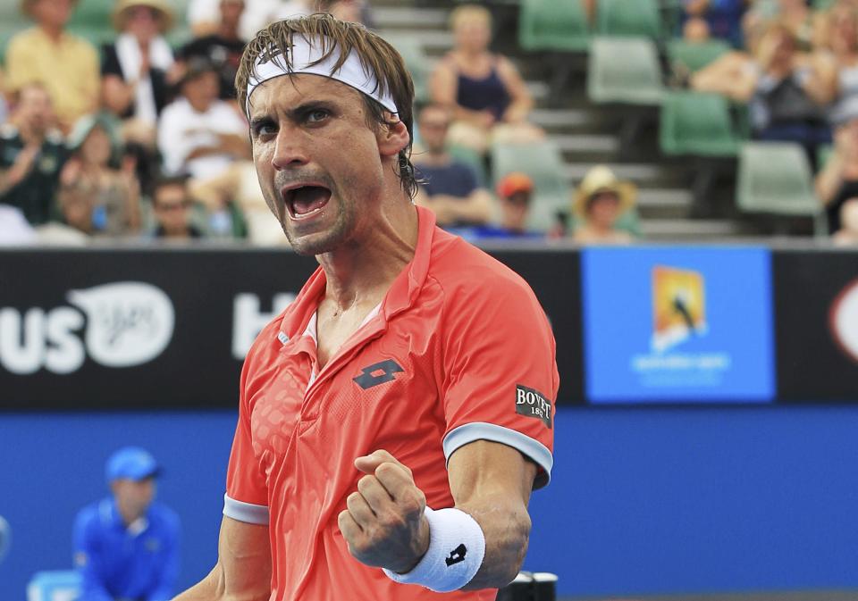 David Ferrer of Spain reacts after winning a point against Sergiy Stakhovsky of Ukraine during their men's singles second round match at the Australian Open 2015 tennis tournament in Melbourne January 22, 2015. REUTERS/John French (AUSTRALIA - Tags: SPORT TENNIS)