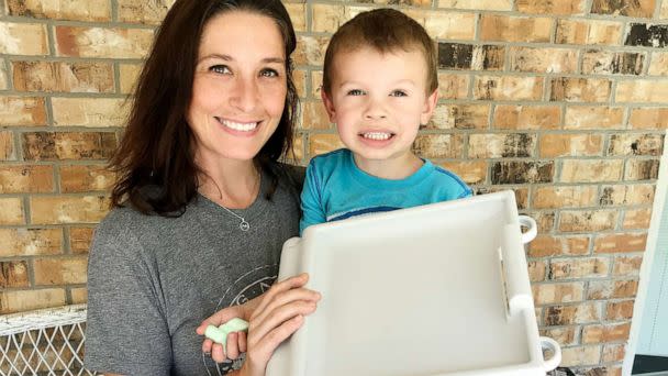 PHOTO:  Nichole Clark poses with her son Jonah holding the Buggie Huggie product she invented. (Buggie Huggie)