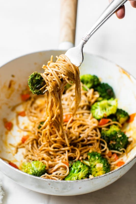 <p>This spicy soba noodle veggie stir fry is a quick and easy meal for one, and perfect as a dairy-free, vegetarian dinner.</p><p><strong>Get the recipe: <a href="https://www.skinnytaste.com/soba-noodle-veggie-stir-fry/" rel="nofollow noopener" target="_blank" data-ylk="slk:Soba Noodle Veggie Stir Fry;elm:context_link;itc:0;sec:content-canvas" class="link rapid-noclick-resp"><em>Soba Noodle Veggie Stir Fry</em></a></strong></p>