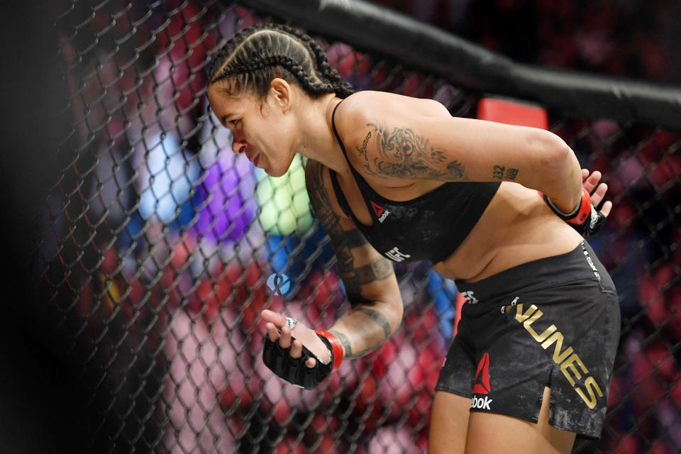 Jul 6, 2019; Las Vegas, NV, USA; Amanda Nunes (red gloves) after her win against Holly Holm (not pictured) at T-Mobile Arena. Mandatory Credit: Stephen R. Sylvanie-USA TODAY Sports