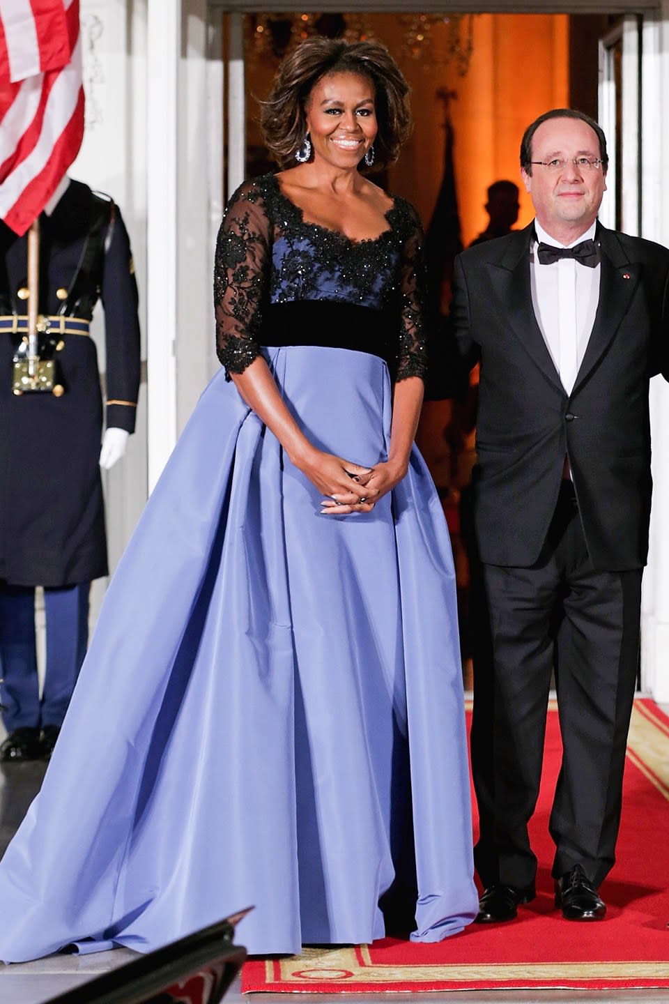 <p>At the 2014 state dinner for France wearing Carolina Herrera.</p>