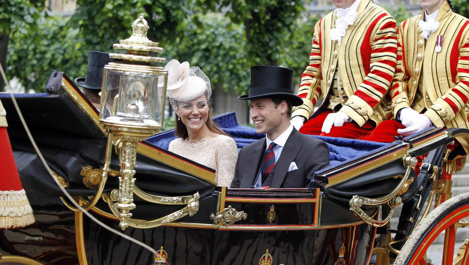 Catherine, Duchess of Cambridge and Prince William, Duke of Cambridge leave Westminster Hall after a Diamond Jubilee Luncheon given for The Queen by The Livery Companies of The City of London on June 5, 2012 in London, England. For only the second time in its history the UK celebrates the Diamond Jubilee of a monarch. Her Majesty Queen Elizabeth II celebrates the 60th anniversary of her ascension to the throne today with a carriage procession and a service of thanksgiving at St Paul's Cathedral. (Photo by Peter Byrne - WPA Pool/Getty Images)