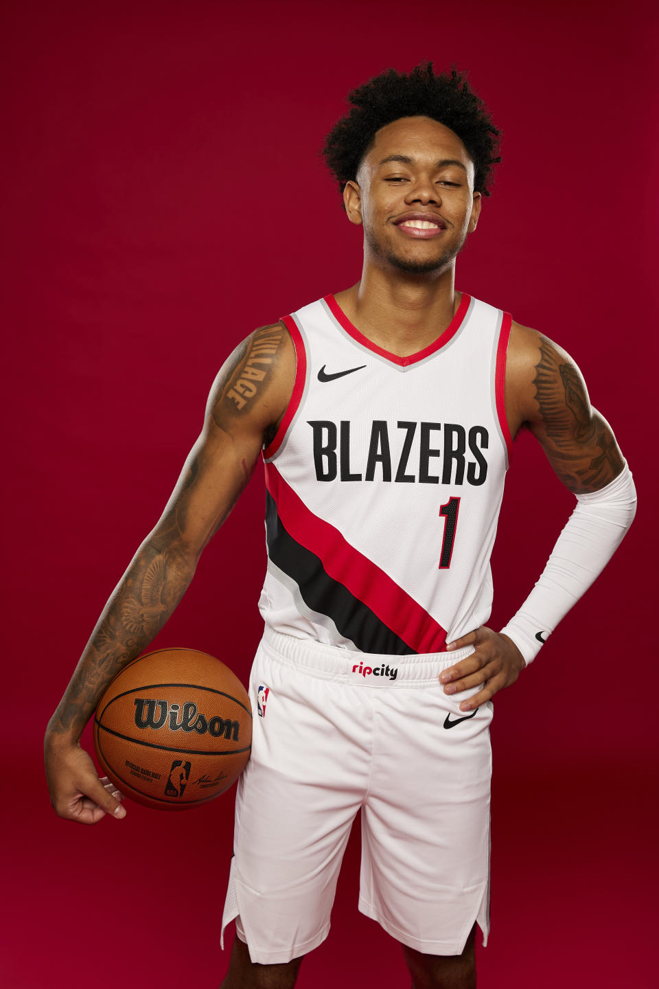 Portland Trail Blazers guard Anfernee Simons poses for a portrait during the NBA basketball team's media day in Portland, Ore., Monday, Oct. 2, 2023. (AP Photo/Craig Mitchelldyer)