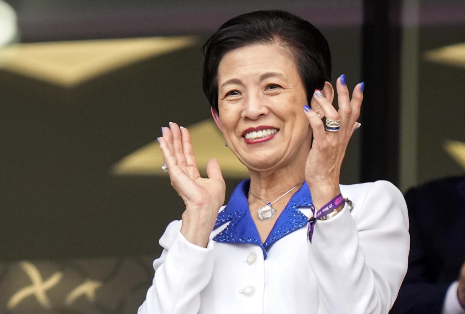 Japan's Hisako, Princess Takamado claps hands on the tribune before the World Cup, group E football match between Japan and Costa Rica, at the Ahmad Bin Ali Stadium in Al Rayyan , Qatar, Sunday, Nov. 27, 2022. (AP Photo/Eugene Hoshiko)