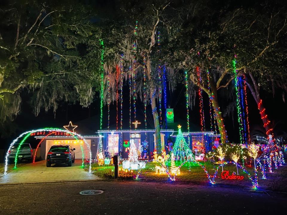 Shana Johnson's display on Arcaro Court West includes giant icicles and arches.