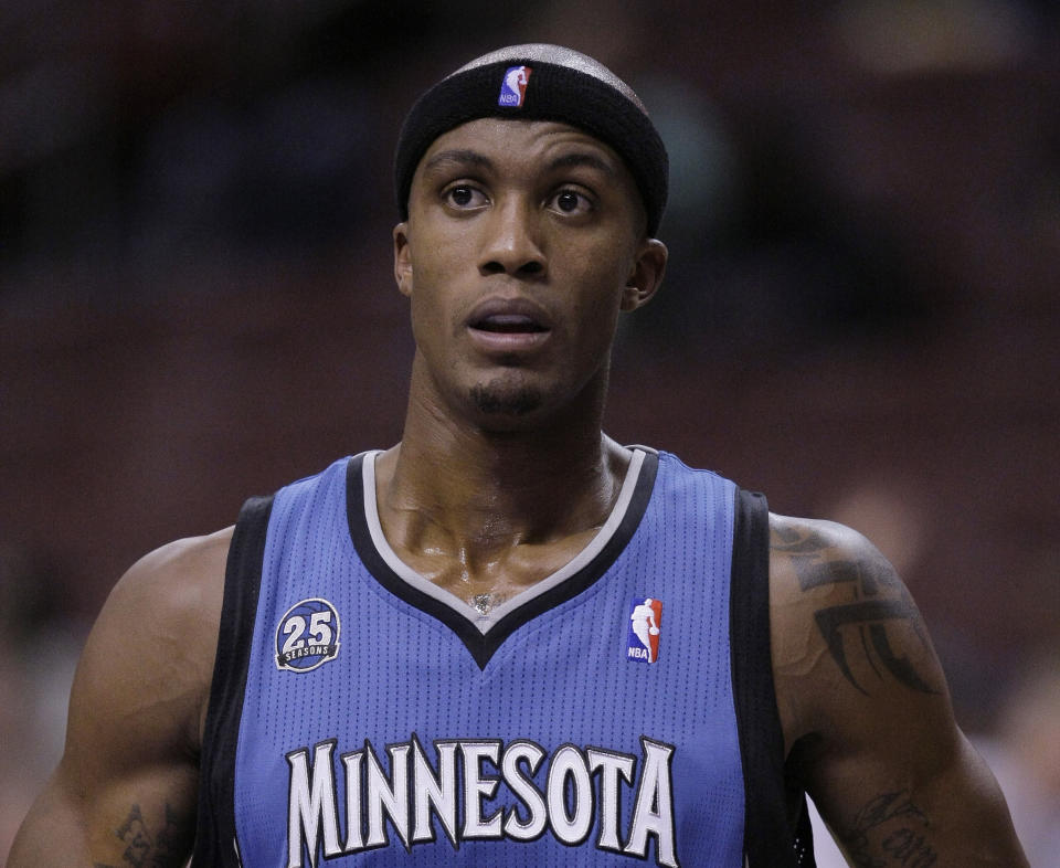 In this Oct. 23, 2013, photo, Minnesota Timberwolves' Dante Cunningham pauses during the Timberwolves' preseason NBA basketball game against the Philadelphia 76ers in Philadelphia. Police have arrested Cunningham for the second time in three days. Medina, Minn., police Officer Chris McGill says the 26-year-old Cunningham was arrested Sunday, April 6, 2014, on preliminary charges of making terrorist threats. He declined to go into detail about the allegations but said police would release more information about the arrest on Monday. (AP Photo/Laurence Kesterson)