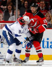 NEWARK, NJ - MARCH 29: Travis Zajac #19 of the New Jersey Devils takes a handful of the helmet of Steven Stamkos #91 of the Tampa Bay Lightning during the second period of an NHL hockey game at Prudential Center on March 29, 2012 in Newark, New Jersey. (Photo by Paul Bereswill/Getty Images) *** BESTPIX ***