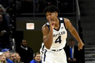 Butler guard Khalif Battle (4) after sinking a 3-point basket against DePaul during the first half of an NCAA college basketball game Saturday, Jan. 18, 2020, in Chicago. (AP Photo/Matt Marton)