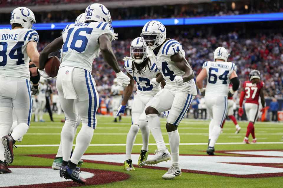 Indianapolis Colts wide receiver Ashton Dulin (16) celebrates with teammates after making a catch for a touchdown against the Houston Texans during an NFL football game, Sunday, Dec. 5, 2021, in Houston. (AP Photo/Eric Christian Smith)