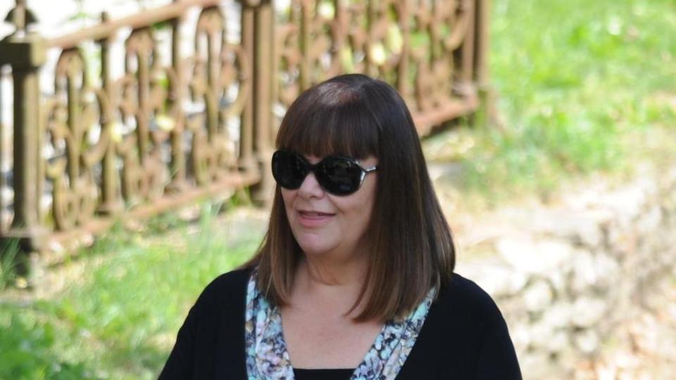 Dawn French arrives for the funeral of Rik Mayall at St George&#39;s church in Dittisham, Devon