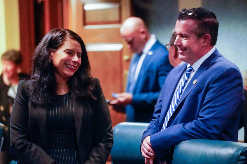 From left, Sen. Cyndi Carrasco (R, Indianapolis) chats with Sen. Aaron Freeman (R, Indianapolis) on Org Day, the ceremonial first day of the 2024 legislative session on Tuesday, Nov. 21, 2023, at the Indiana Statehouse in Indianapolis.