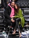 <p>Steve Kazee and Jenna Dewan cozy up as the Los Angeles Clippers take on the San Antonio Spurs at Staples Center on Dec. 20 in L.A. </p>