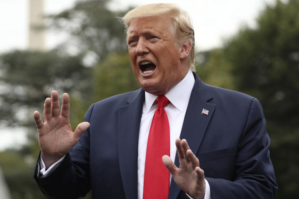 President Donald Trump speaks to members of the media on the South Lawn of the White House in Washington, Monday, Sept. 9, 2019, before boarding Marine One for a short trip to Andrews Air Force Base, Md., and then on to North Carolina. (AP Photo/Andrew Harnik)