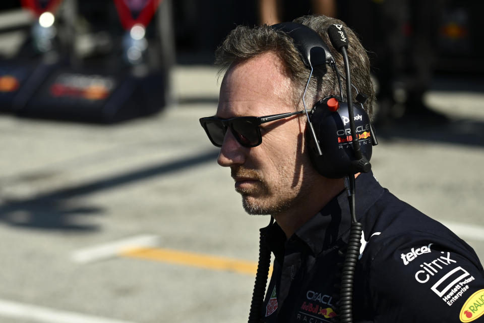 Red Bull team principal Christian Horner walks on the pit lane during the qualifying session ahead of Sunday's Formula One Dutch Grand Prix auto race, at the Zandvoort racetrack, in Zandvoort, Netherlands, Saturday, Sept. 3, 2022. (Christian Bruna/Pool via AP)