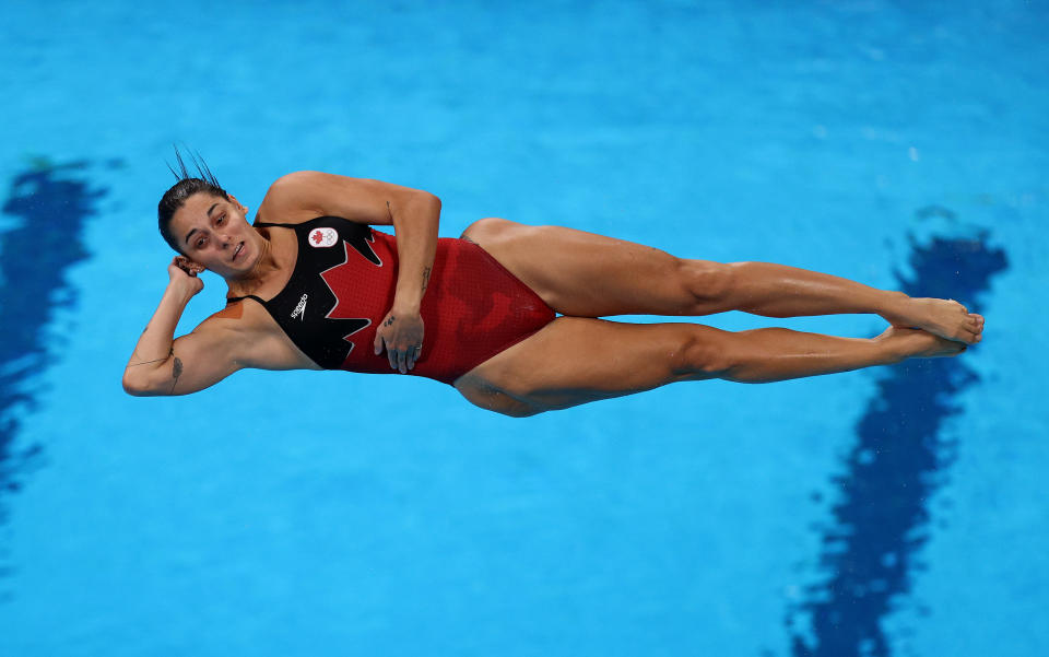 <p>TOKYO, JAPAN - JULY 30: Pamela Ware of Team Canada competes during the Women's 3m Springboard Preliminary round on day seven of the Tokyo 2020 Olympic Games at Tokyo Aquatics Centre on July 30, 2021 in Tokyo, Japan. (Photo by Maddie Meyer/Getty Images)</p> 