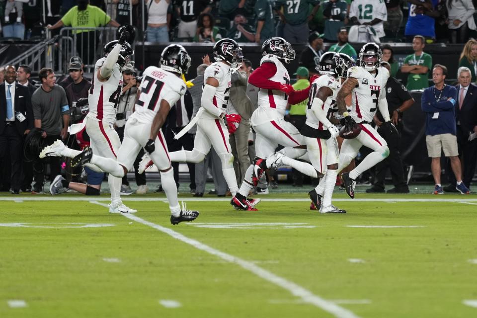 Atlanta Falcons safety Jessie Bates III (3) reacts to intercepting a pass during the second half of an NFL football game against the Philadelphia Eagles on Monday, Sept. 16, 2024, in Philadelphia. (AP Photo/Matt Slocum)