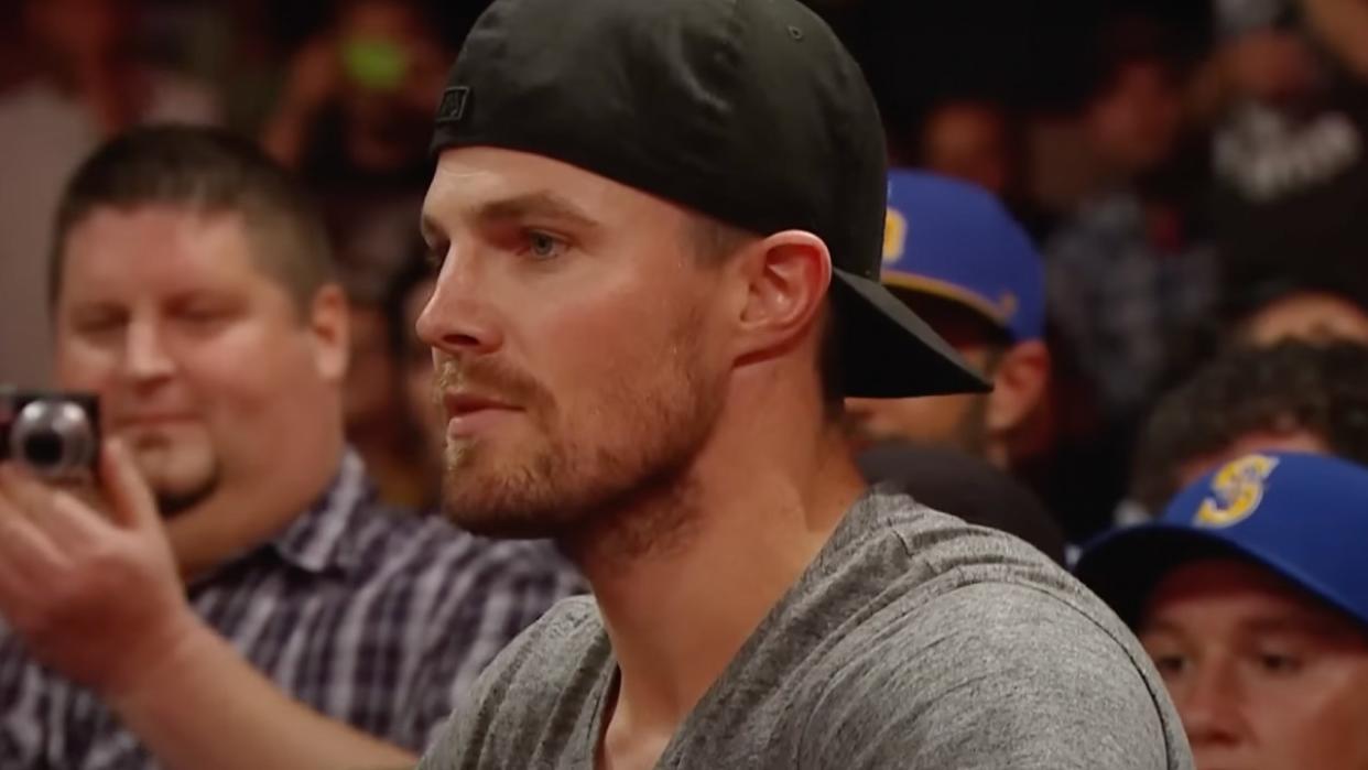  Stephen Amell being taunted by Stardust on Monday Night Raw. 