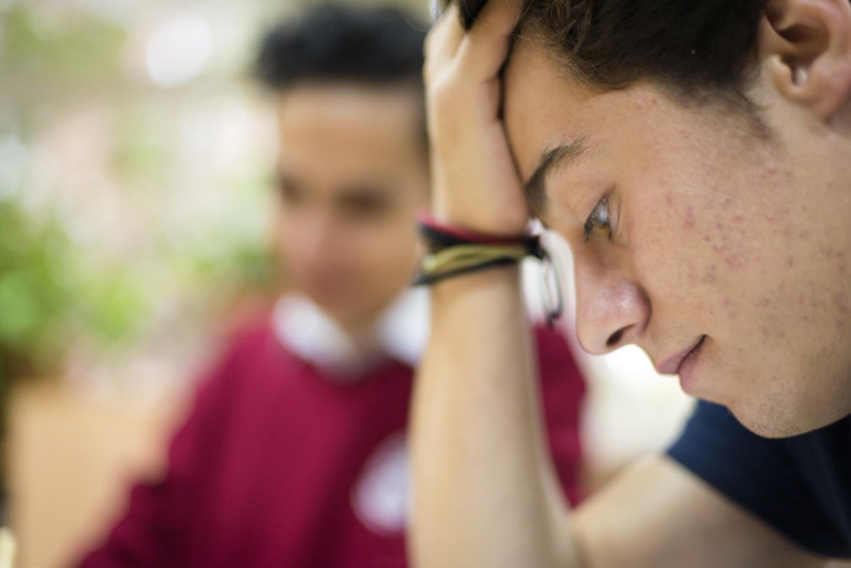 Your teen's diet, skincare routine and stress levels all play a role in their acne. (Photo: Getty Creative)